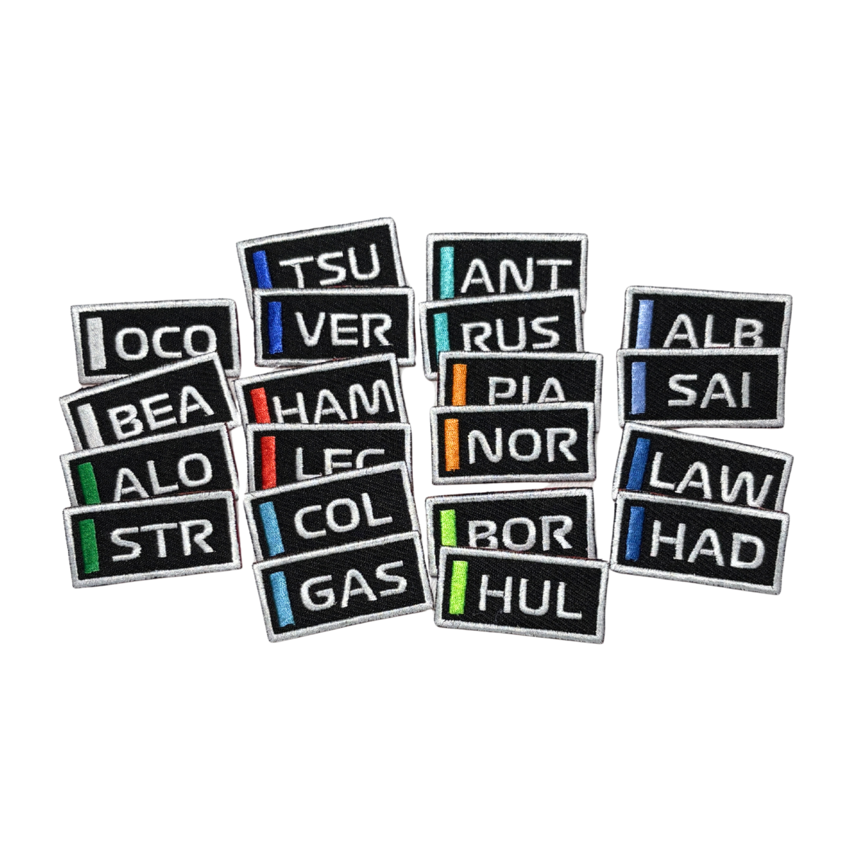 Pinuri brodate inspirate din Formula 1 Sezonul 2025 – colecție cu piloți și echipe